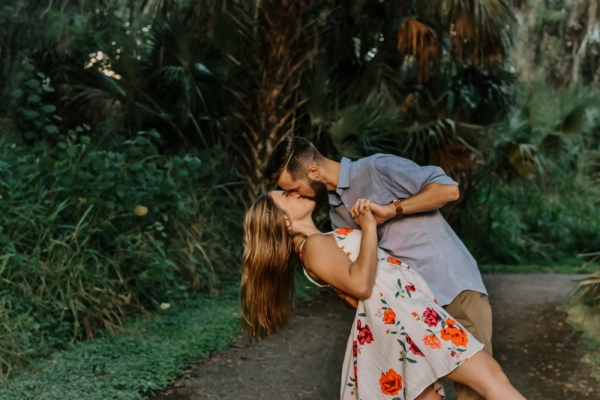 man and woman kissing