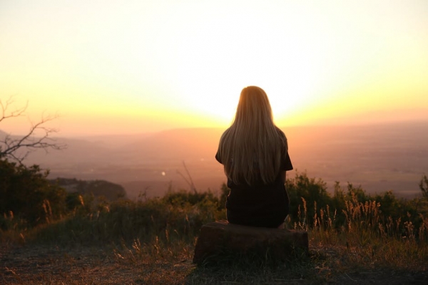 Woman Looking at Sunset